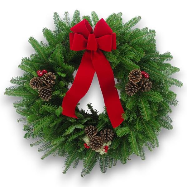 Rockdale Deluxe Wreath with fresh wreaths, gilded pinecones, red berries, and a velvet ribbon.