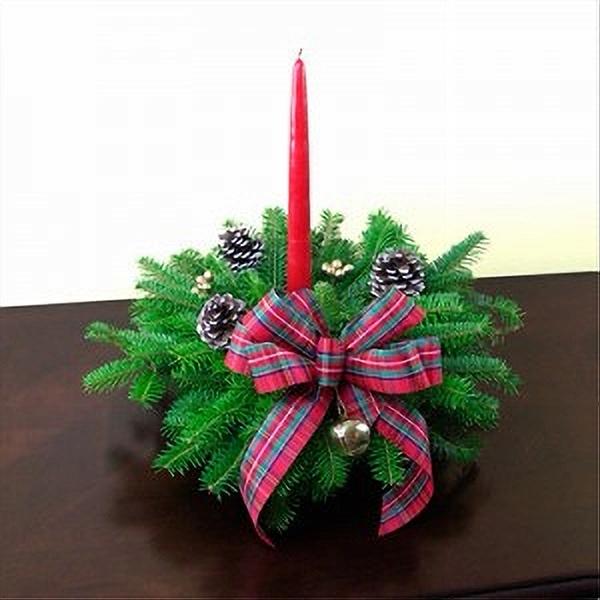 D Bell Centerpiece featuring fresh Balsam greenery with golden bells, frosted pinecones, and a red candle, perfect for adding festive elegance to holiday decor or for corporate gift-giving.