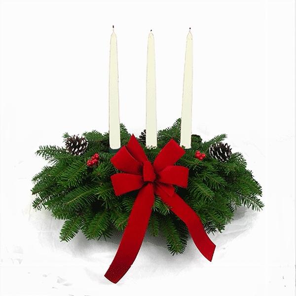 White Candle Centerpiece with Balsam greenery, silver ornaments, and a white candle.